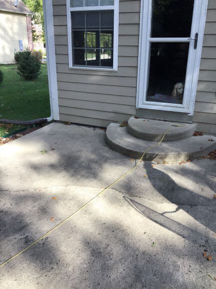 concrete porch with long horizontal crack