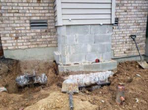 crew repairing chimney