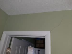 crack in drywall around door