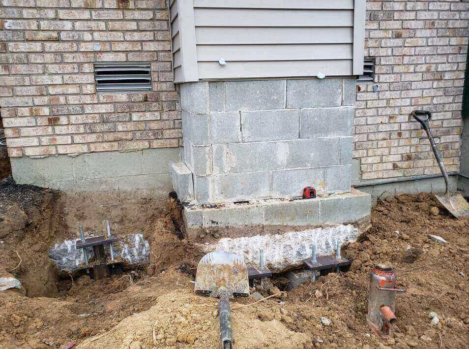 crew repairing chimney