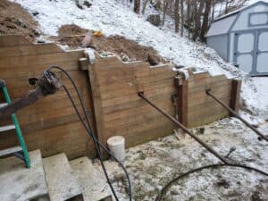 same retaining wall, during repair