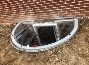 fully installed egress window with well