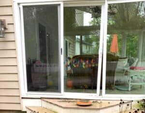 enclosed porch with large gap under door