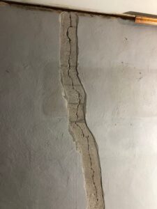 widening crack in concrete